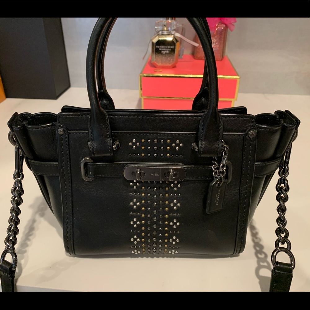 Coach small purse w/gold & silver hardware detail